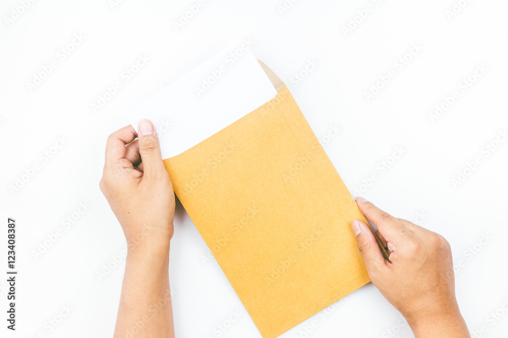 Hands holding brown leather envelope with a empty paper on white Hands holding brown leather envelope with a empty paper on white