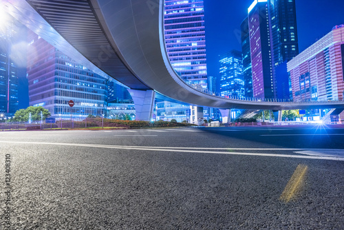 Fototapeta Naklejka Na Ścianę i Meble -  Empty asphalt road through modern city in Shanghai,China.