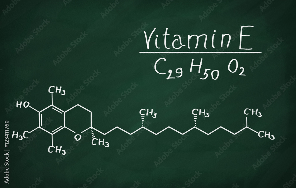 Structural model of Vitamin E (tocopherol) on the blackboard. Structural model of Vitamin E (tocopherol) on the blackboard.