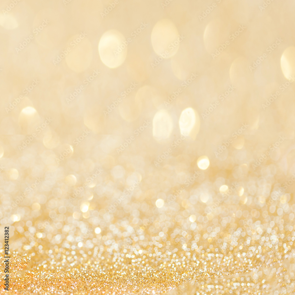 Golden glitter christmas abstract background with bokeh defocuse Golden glitter christmas abstract background with bokeh defocuse