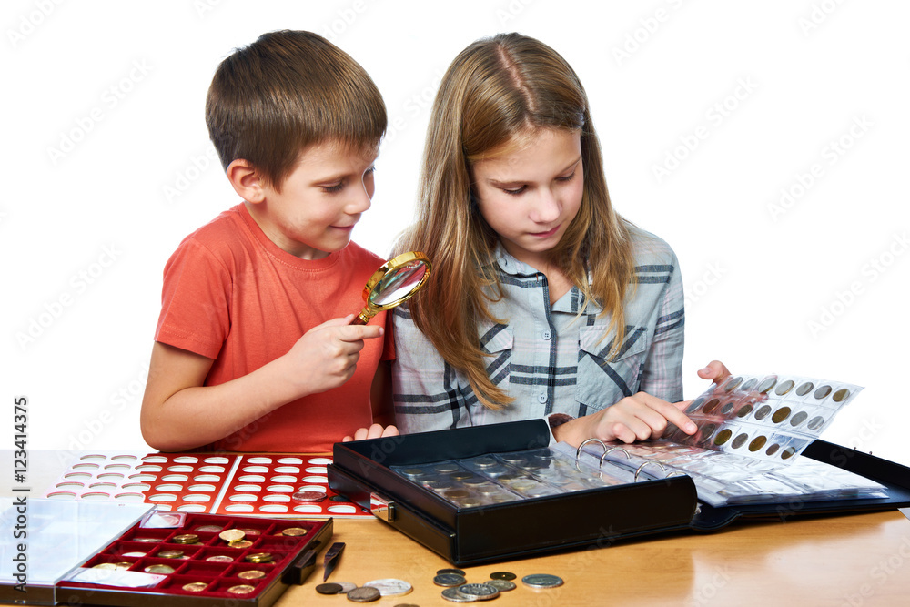 Fototapeta premium Boy and girl are considering coin collection isolated