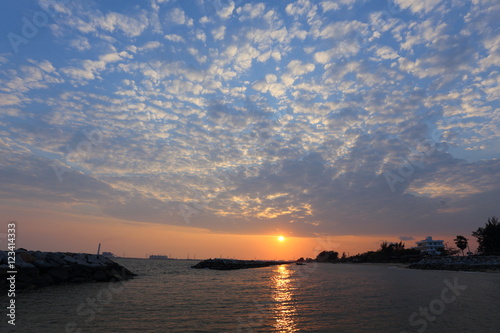 Rock breakwater and Blue sky in Rayong at Thailand photo