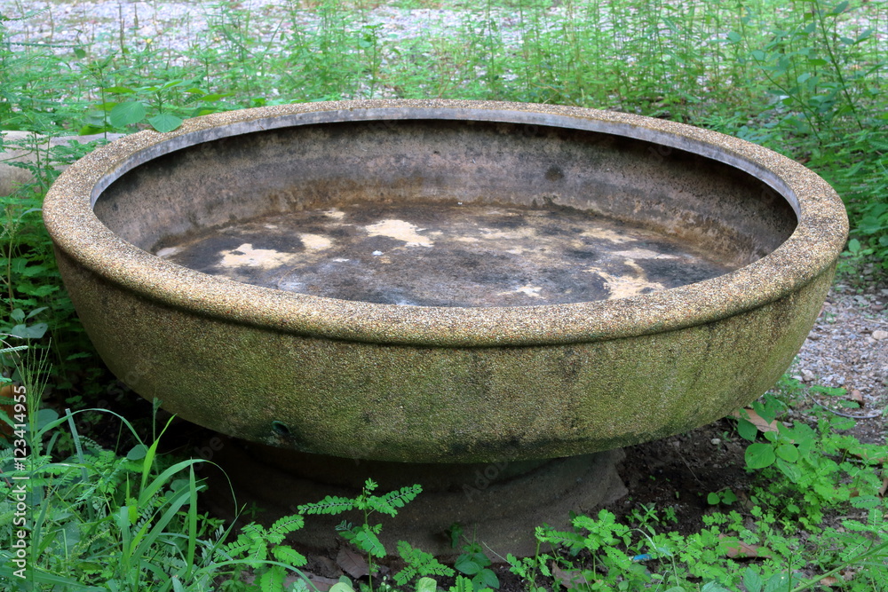 Fototapeta premium Garden outdoor water basin, old basin