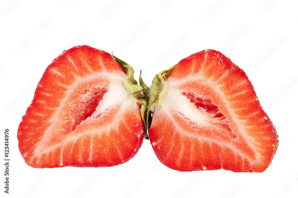 fruits of red cut strawberries isolated on white background fruits of red cut strawberries isolated on white background