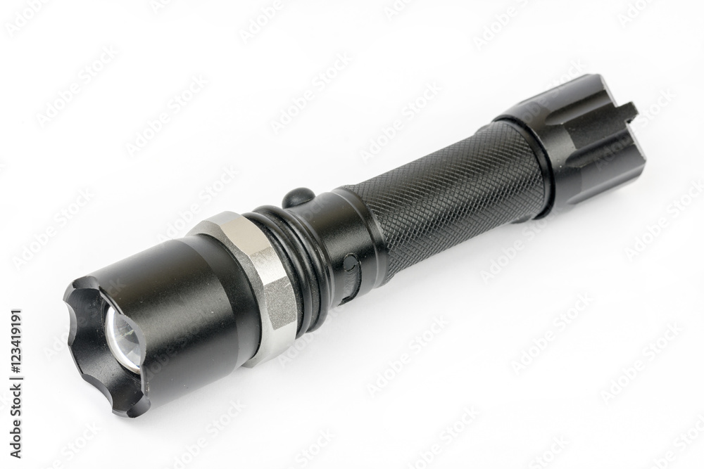 Black police torchlight over white background Black police torchlight over white background