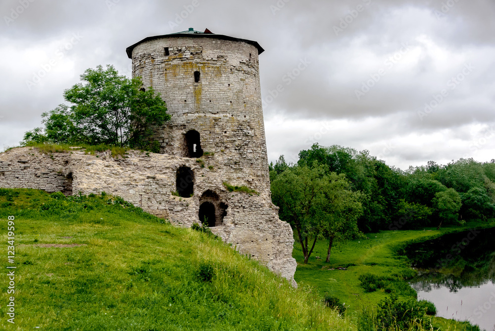 Gremyachaya Tower in the city of Pskov in cloudy weather