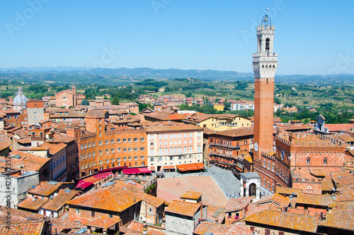The Torre del Mangia, tower located in the ancient medieval historical city centre at Piazza del Campoin in Siena, Tuscany region, Italy © pyty