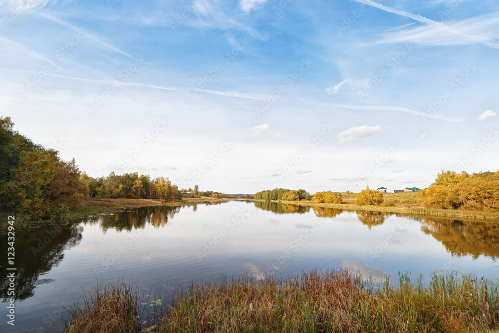 Autumn landscape of lake with reeds.