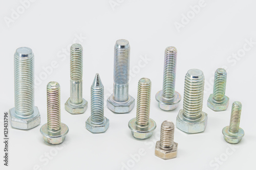 Group of Stainless steel bolt on white background and selective focus