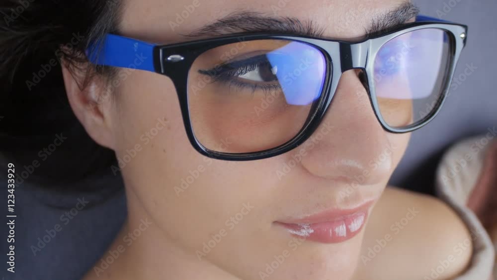 close-up portrait of woman with glasses