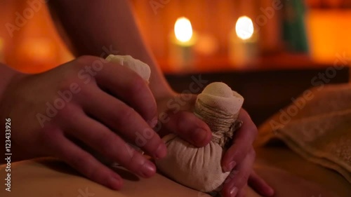 Wallpaper Mural massage with herbal bags close up. Torontodigital.ca