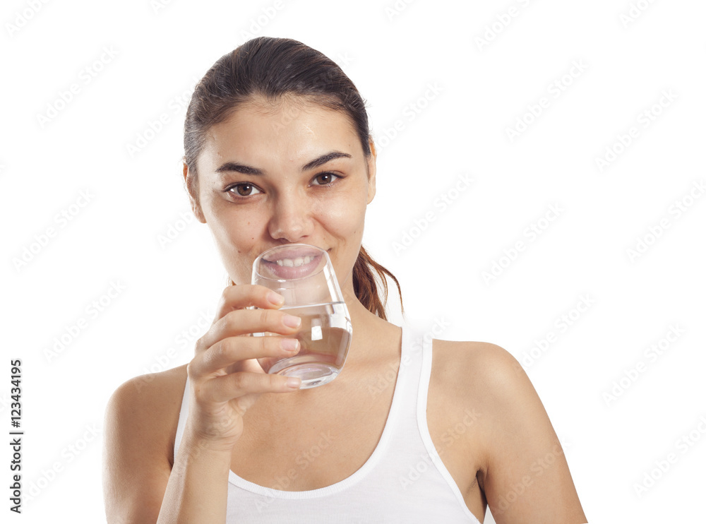Young woman drinking glass of water Young woman drinking glass of water