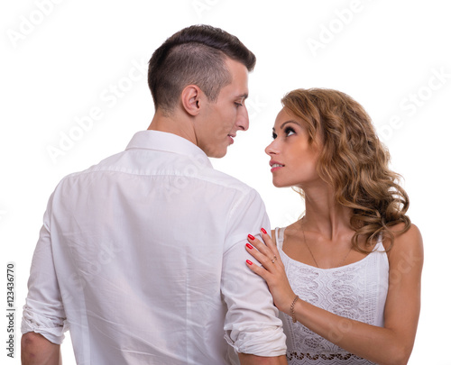 Cheerful young couple on white background, isolated