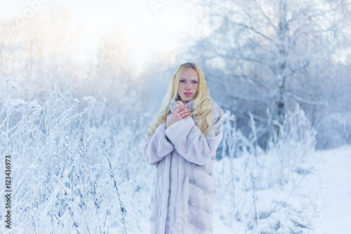 Model in winter forest © antonburkhan
