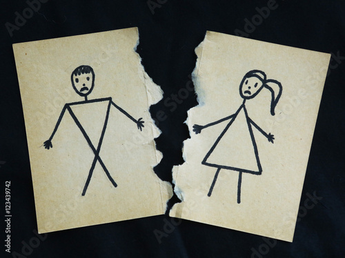 man and woman drawing torn apart