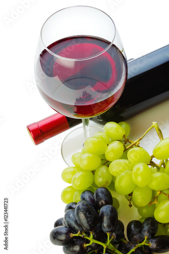 bottle of wine and grapes isolated