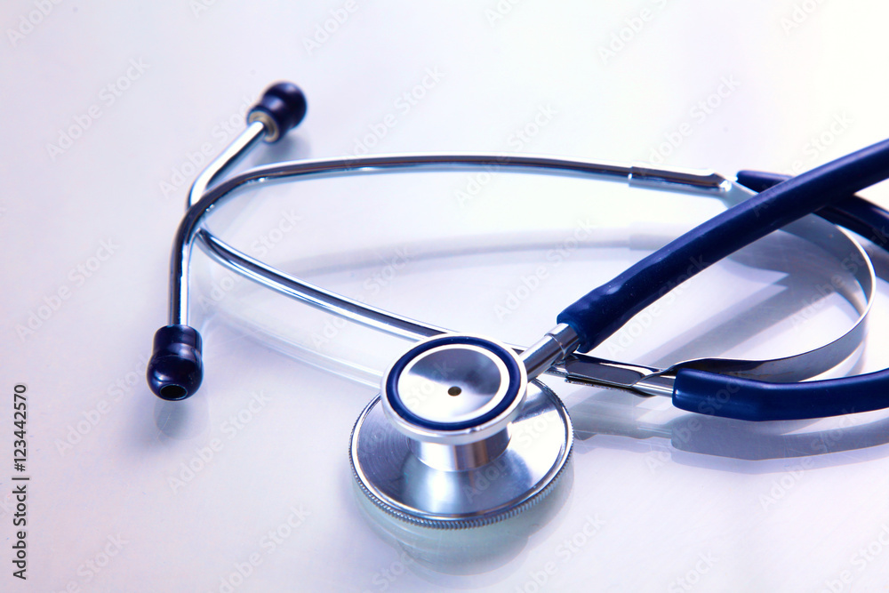 close up medical stethoscope on a white background close up medical stethoscope on a white background