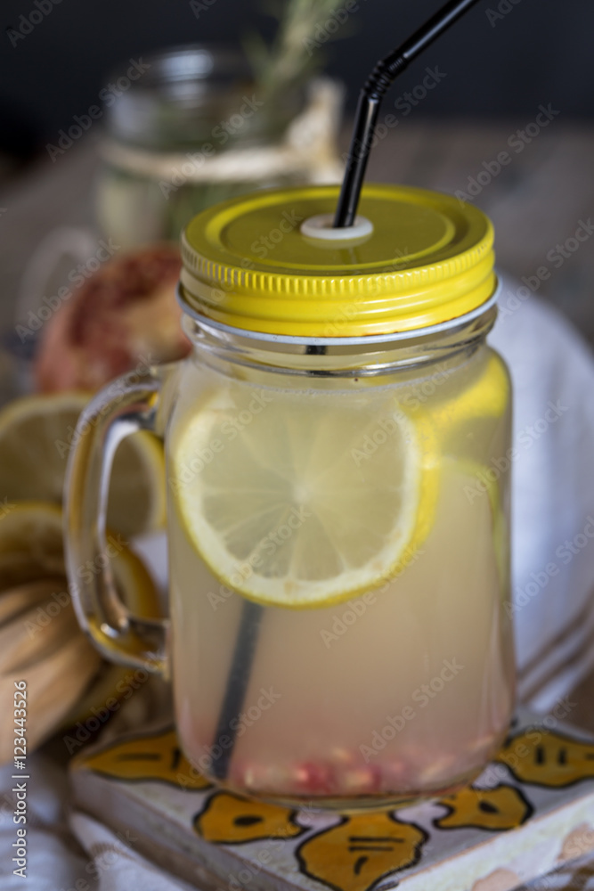 Lemonade with fresh lemon on wooden background Lemonade with fresh lemon on wooden background