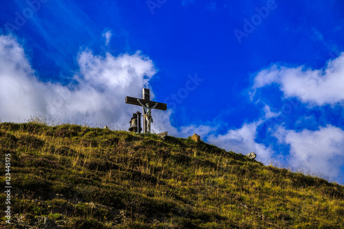 cross with Jesus on the mountain in Switzerland