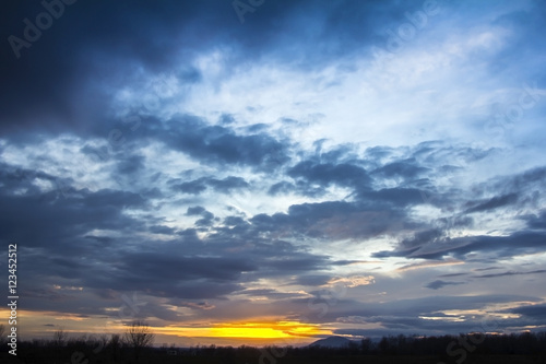 Landscape Dramatic sunset and sunrise sky with a silhouette of t