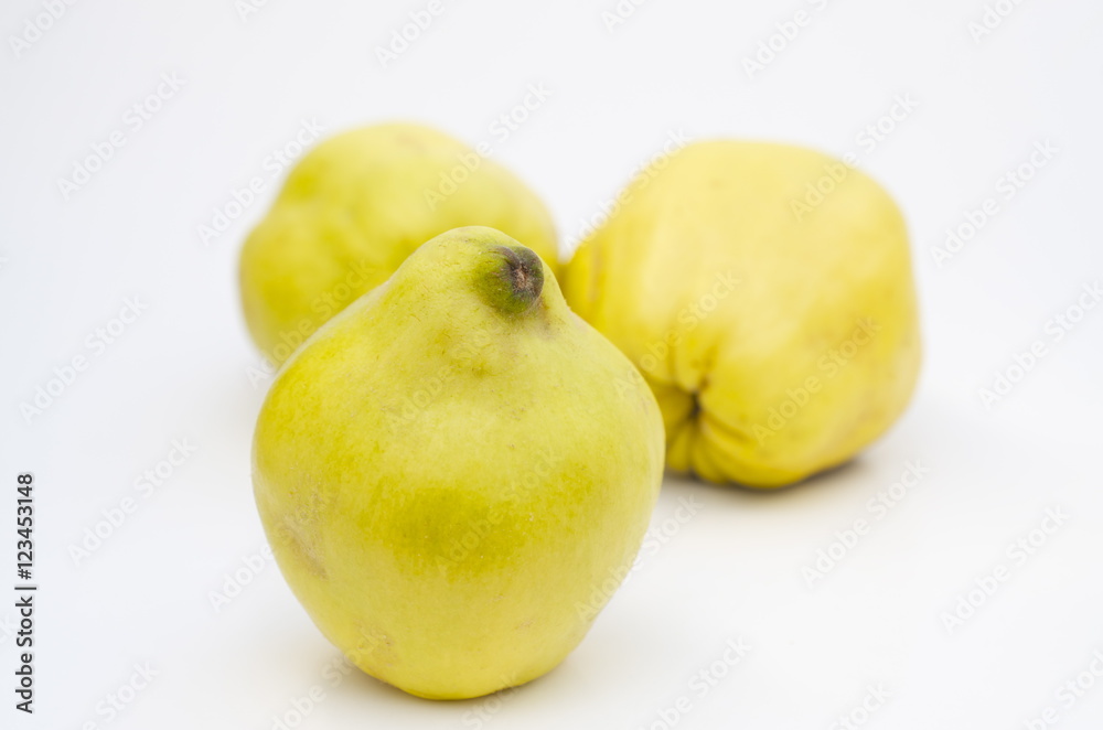 Quinces on white background