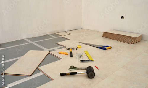 Installing New Laminate Wood Flooring Abstract, text for copy sp