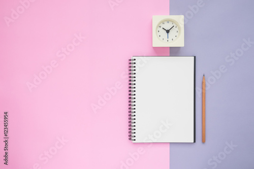 Top view of notebook pencil clock