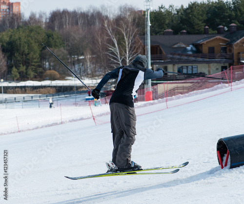 skier slides on rails photo