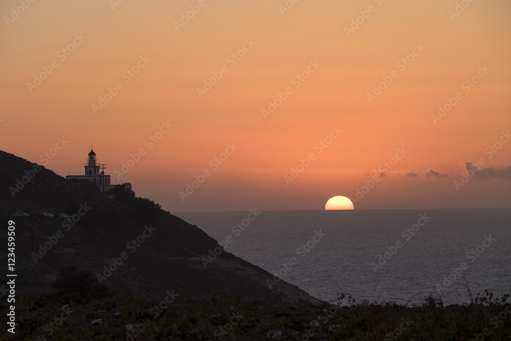 Santorini lighthouse sunset