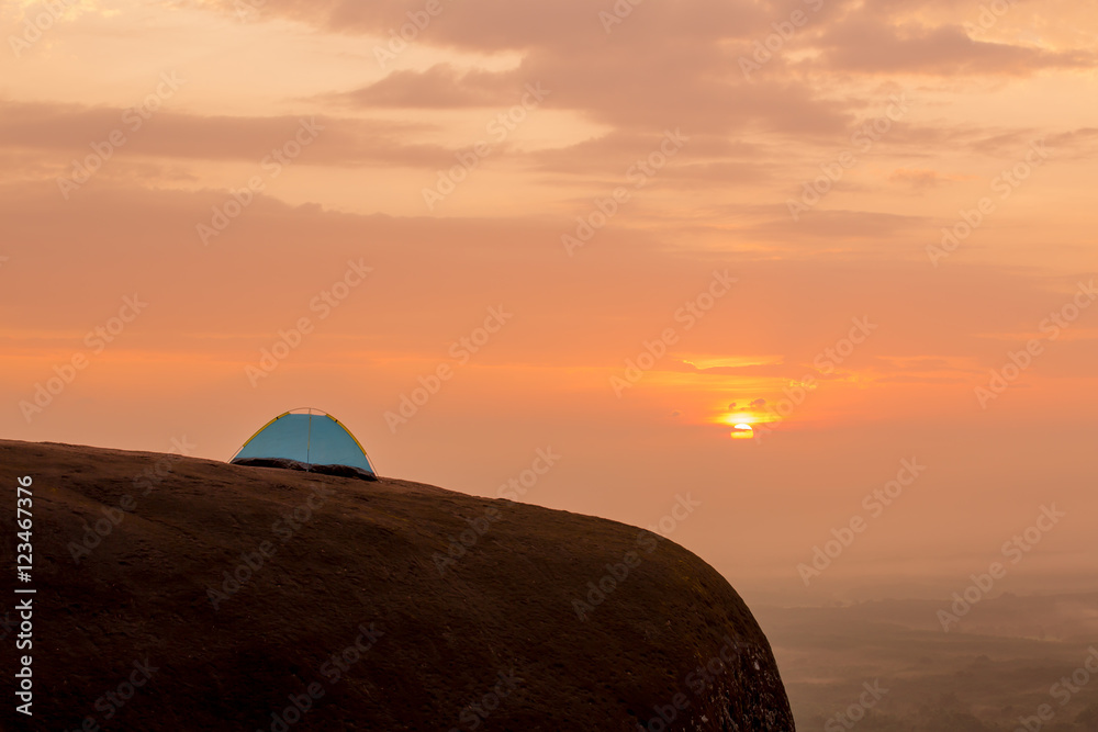 Fototapeta premium Tourist tent in camp among rock in the mountain