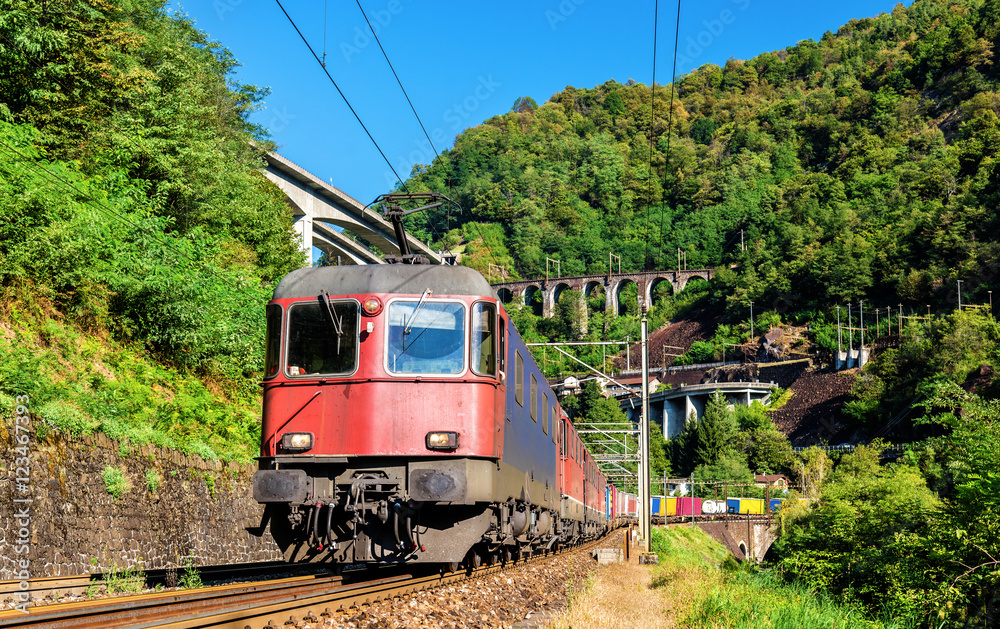 Obraz premium Freight train goes down the Gotthard pass - Switzerland