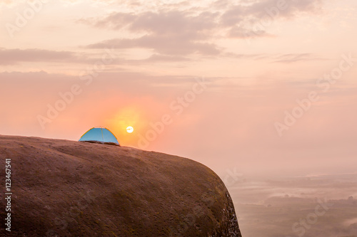 Tourist tent in camp among rock in the mountain