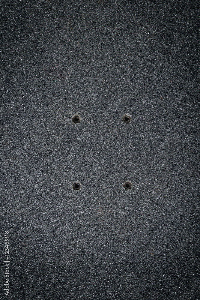 top view of a skateboard and griptape in skatepark