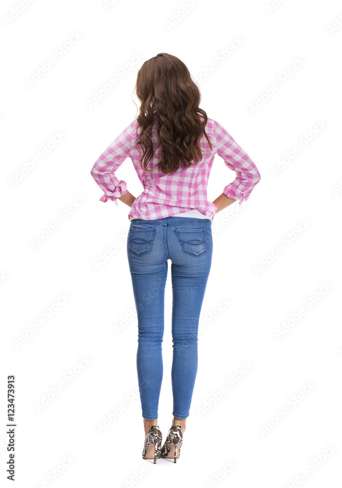 Young beautiful brunette woman in blue jeans Young beautiful brunette woman in blue jeans