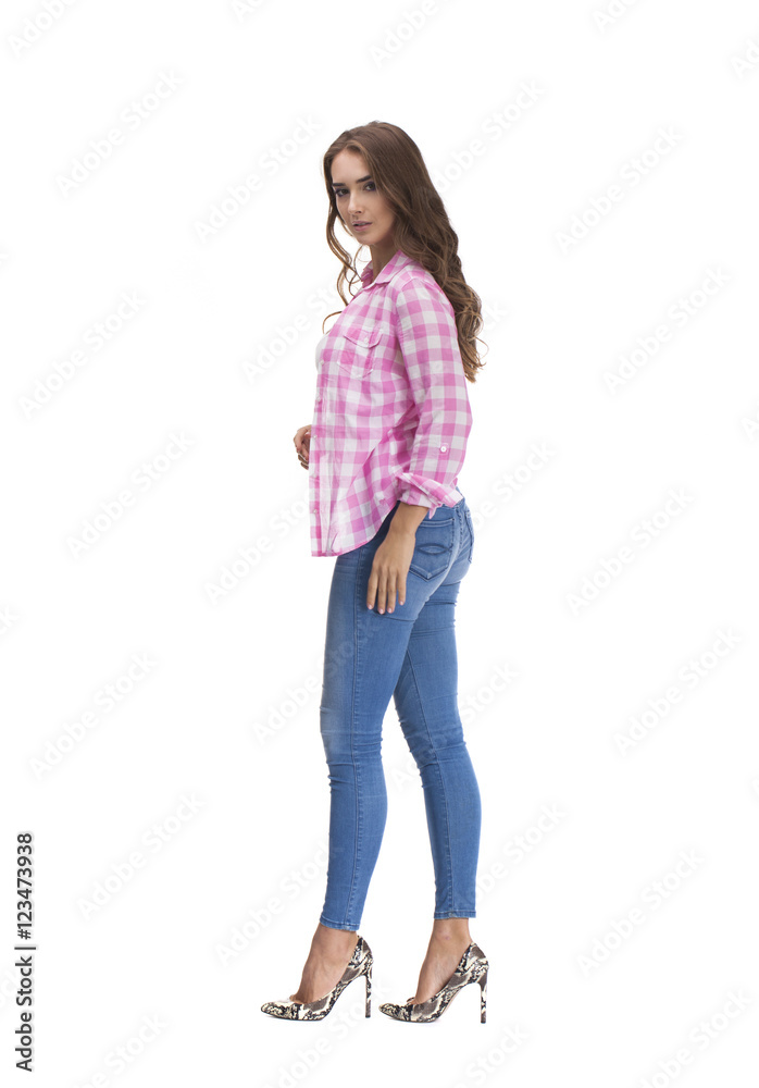 Young beautiful brunette woman in blue jeans Young beautiful brunette woman in blue jeans