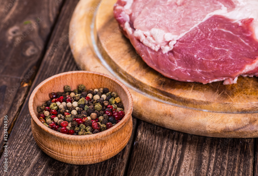 Raw fresh marbled meat Steak and seasonings Raw fresh marbled meat Steak and seasonings