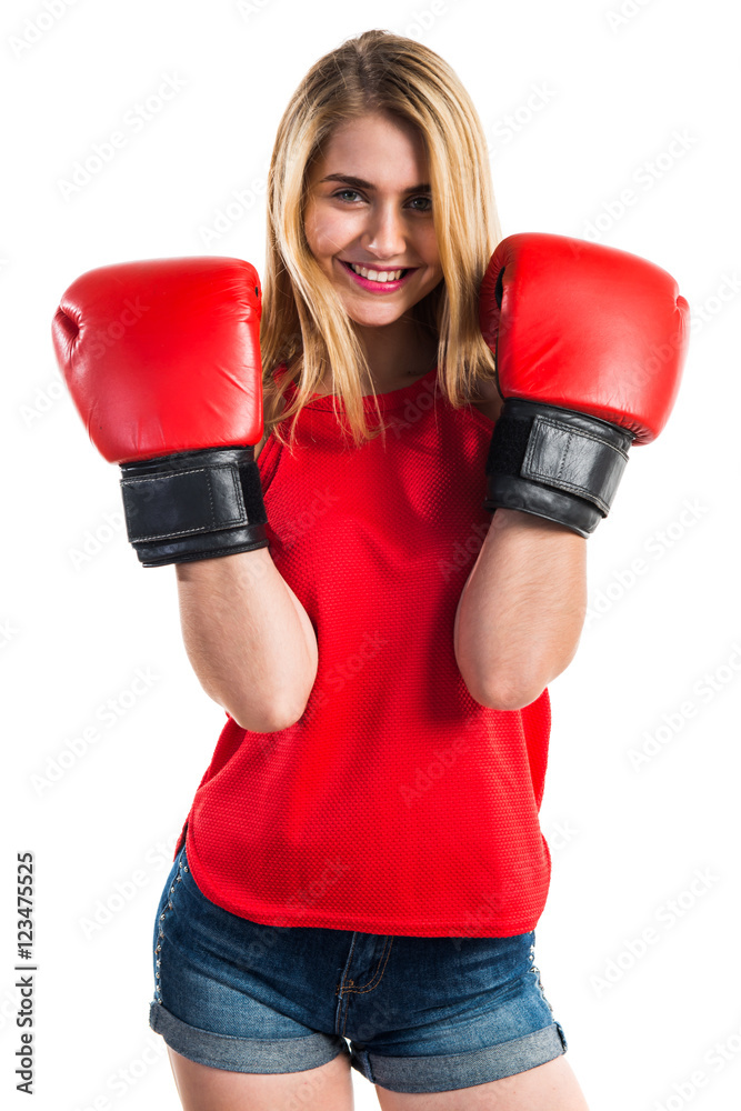 Blonde girl with boxing gloves Blonde girl with boxing gloves