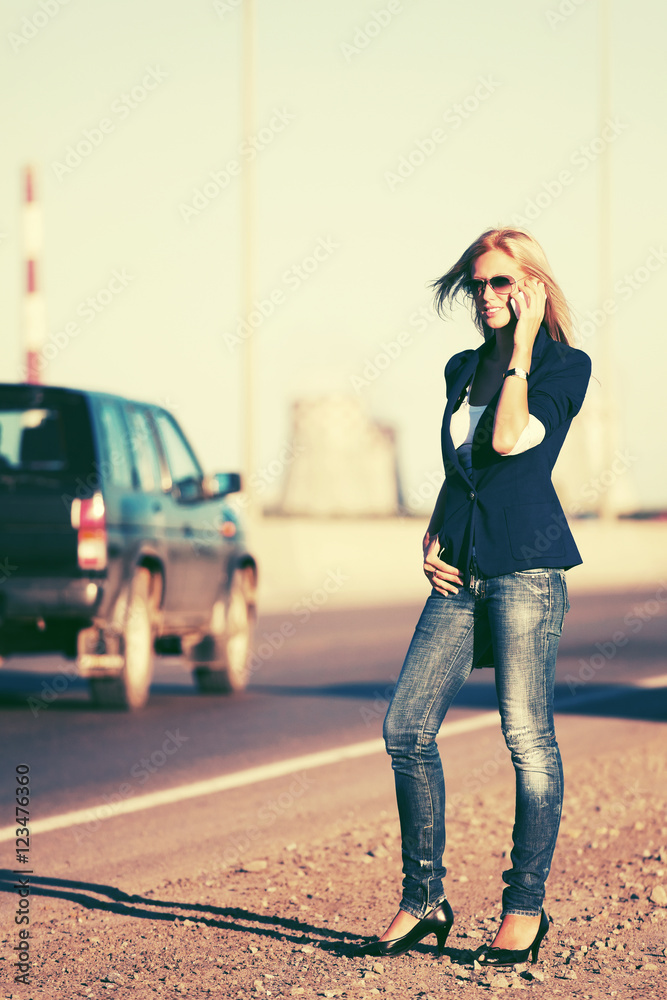 Fashion blond woman calling on the phone outdoor Fashion blond woman calling on the phone outdoor