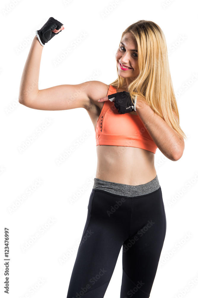 Sport woman making strong gesture Sport woman making strong gesture