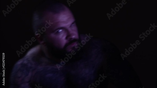 Tattooed psycho man. Timelapse.