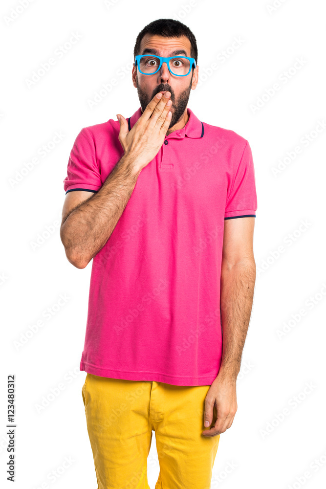 Man with colorful clothes doing surprise gesture Man with colorful clothes doing surprise gesture