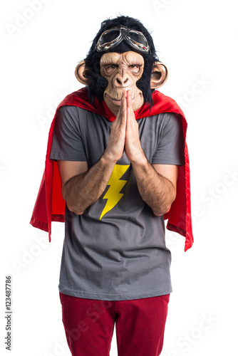 Superhero monkey man pleading