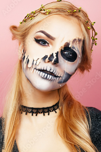Girl with streaks on the face for Halloween