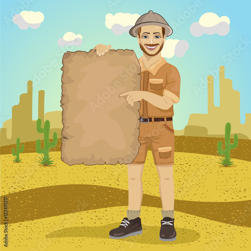explorer young man with safari hat holding treasure map in desert