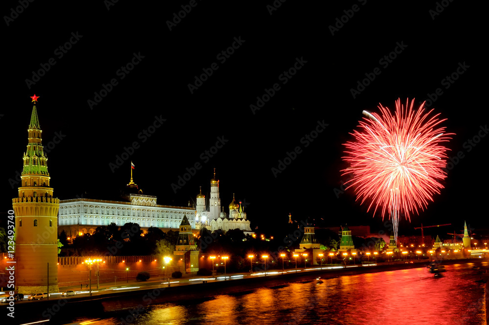 Flashes of pink and white fireworks near Moscow Kremlin