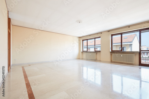 Empty living room with marble floor