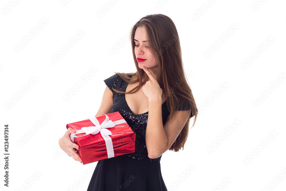 Fototapeta premium Young woman holding a present
