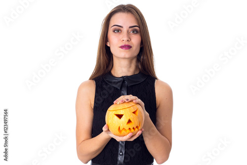 Woman holding a pumpkin