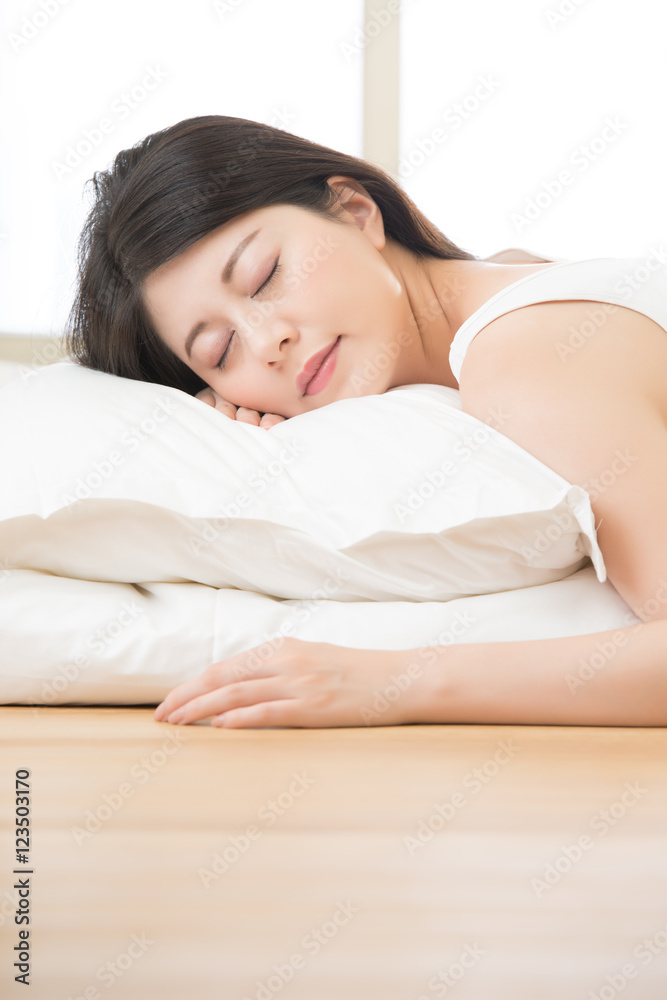 Health woman Smile feel carefree lying on bed in morning Health woman Smile feel carefree lying on bed in morning