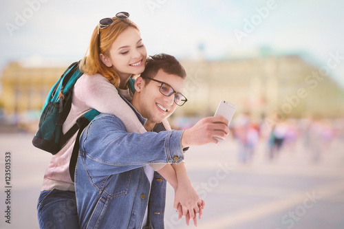 Young happy couple taking s...